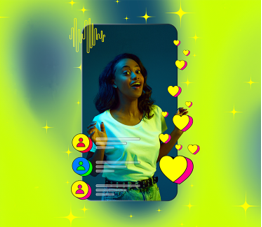 A woman smiles while holding a phone displaying colourful hearts on the screen