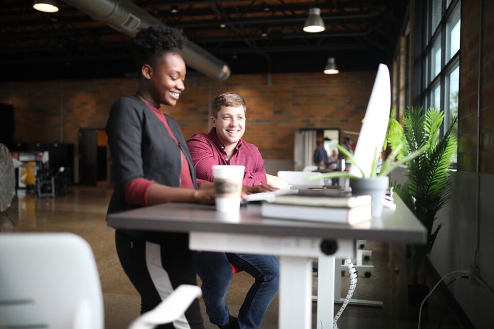 Two individuals attending training