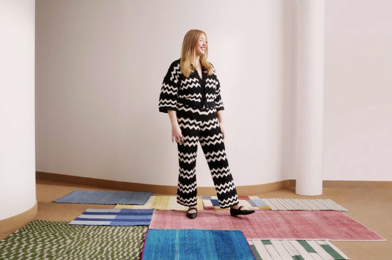 A Partner at John Lewis standing on custom carpets